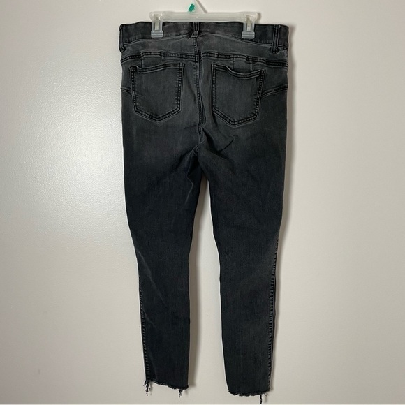 Torrid Bombshell Skinny Jeans | Distressed | Raw Hemline | Black - Picture 6 of 15